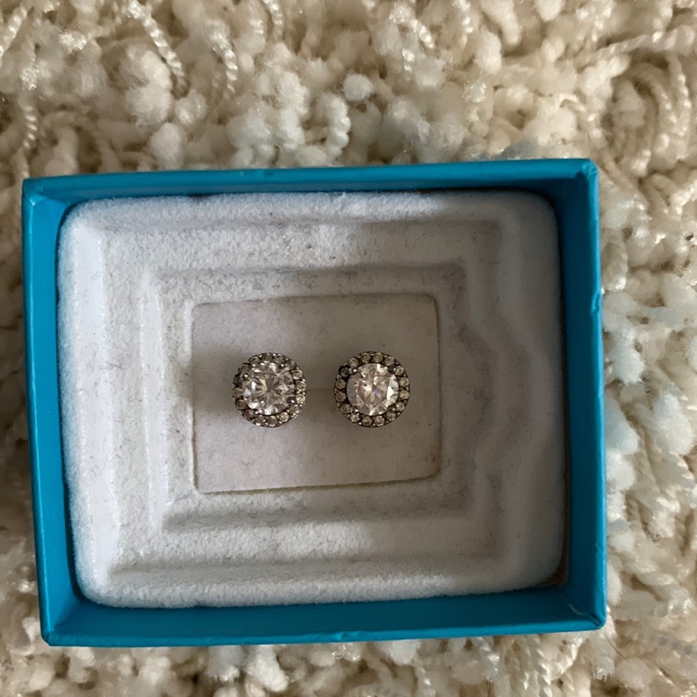 Sterling silver stud earrings.